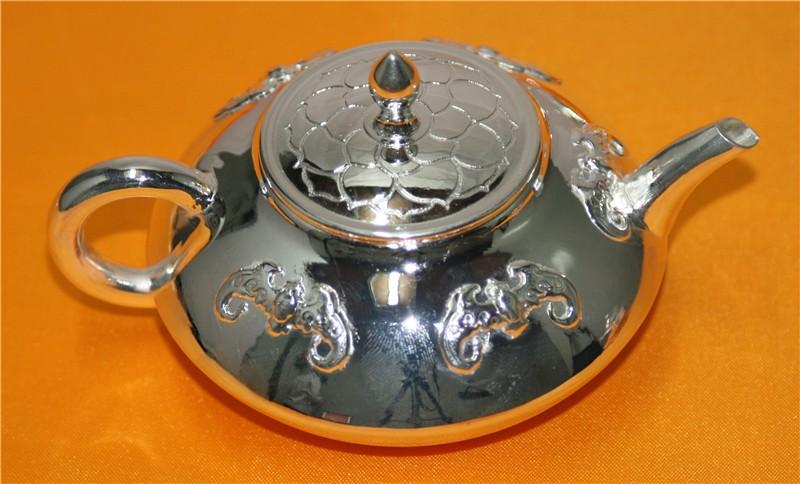纯银茶壶:150g 220ml纯银茶碗:35g    主营产品:纯银茶具银质茶杯